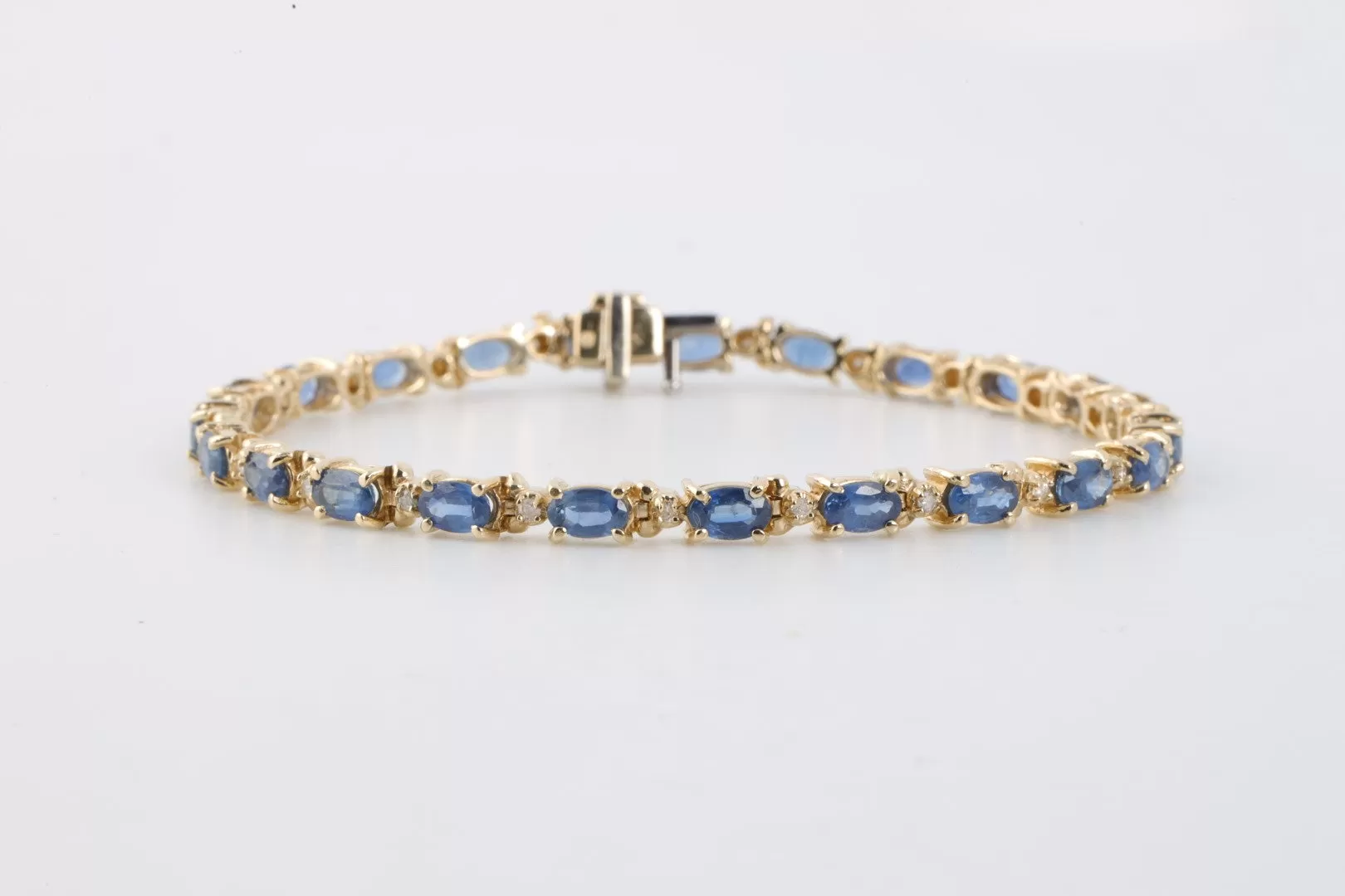 7" 14k Yellow Gold 7.00tcw Sapphire 0.25tcw Diamond Bracelet (10.31g.)