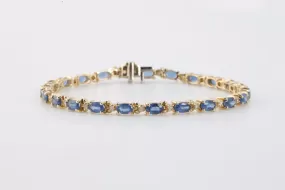 7" 14k Yellow Gold 7.00tcw Sapphire 0.25tcw Diamond Bracelet (10.31g.)