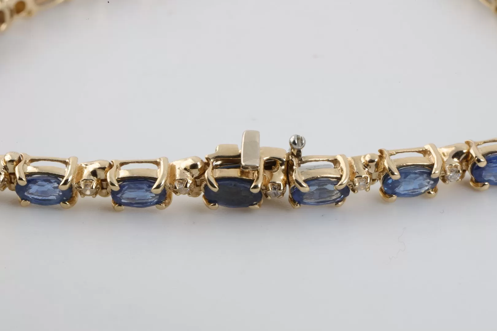 7" 14k Yellow Gold 7.00tcw Sapphire 0.25tcw Diamond Bracelet (10.31g.)