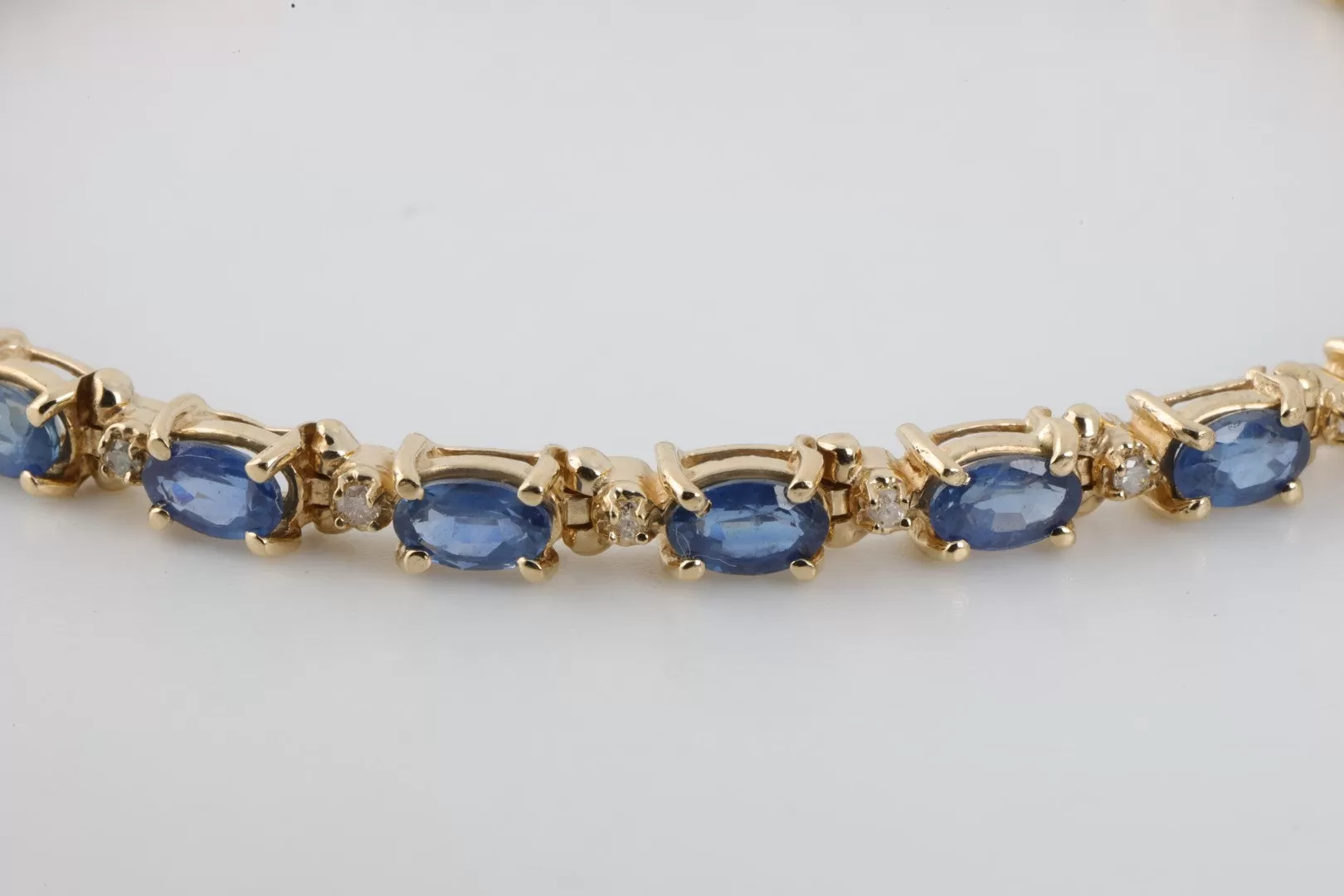 7" 14k Yellow Gold 7.00tcw Sapphire 0.25tcw Diamond Bracelet (10.31g.)