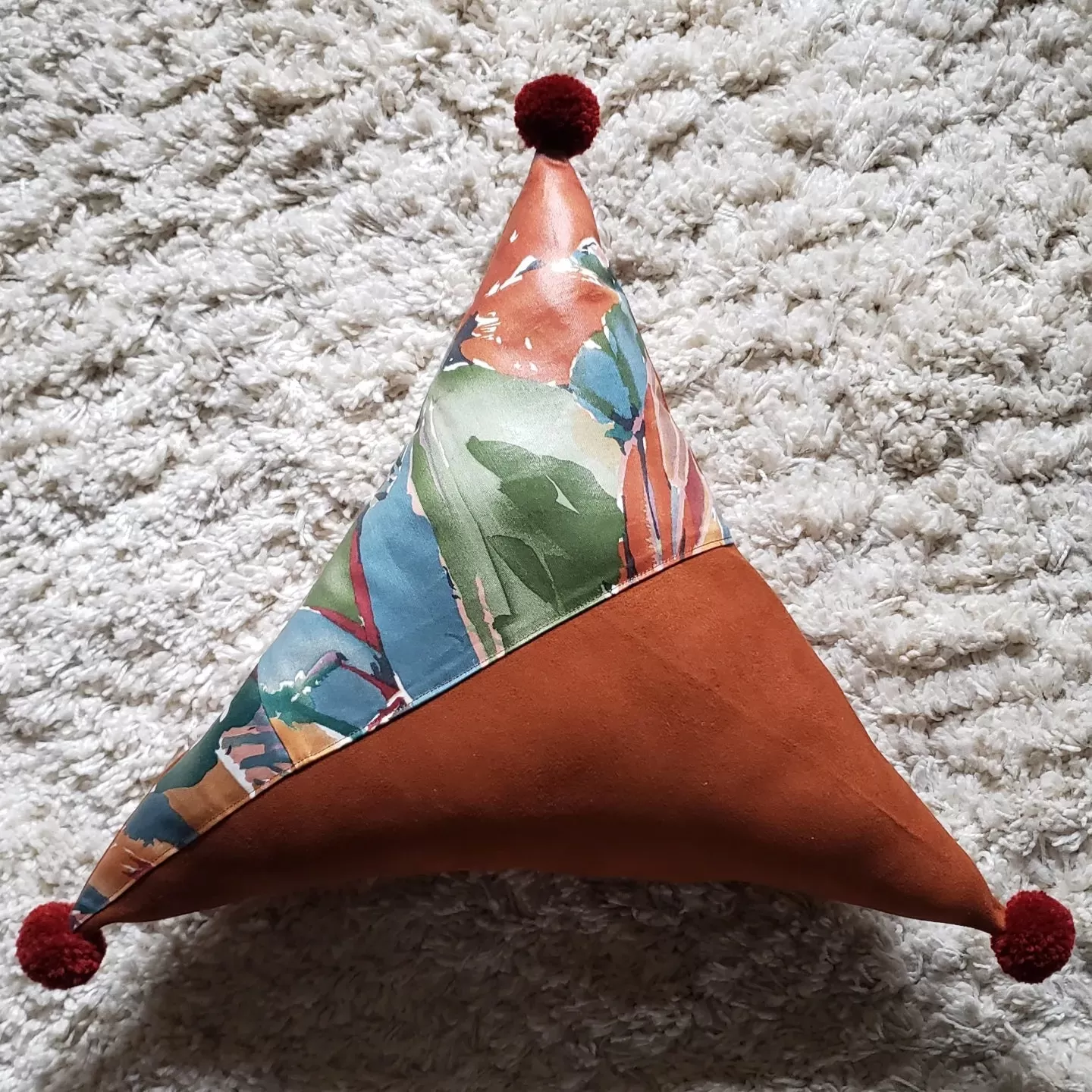 Abstract Rust Floral PomPom Triangle Pillow