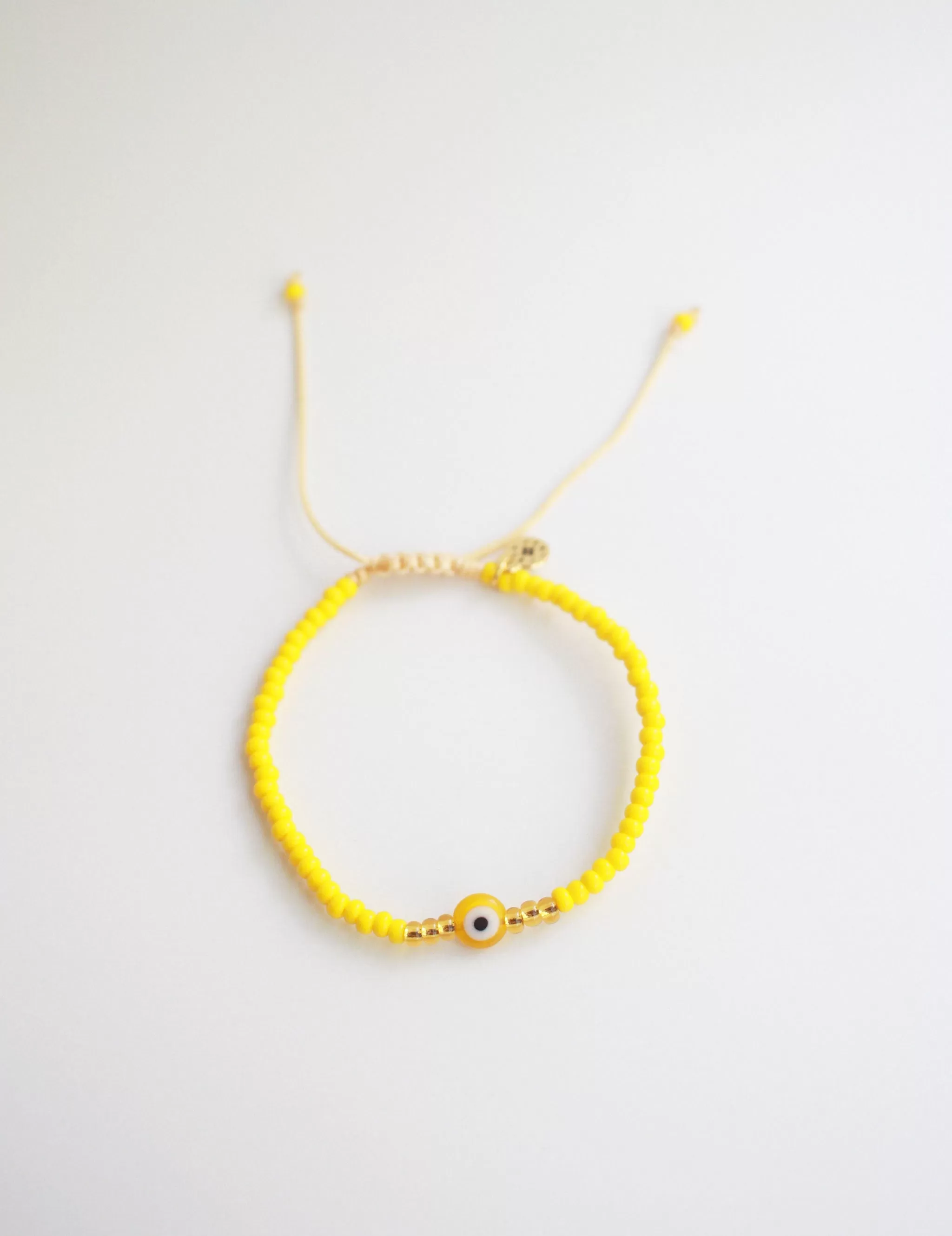 Evil Eye Seed Bead in Yellow